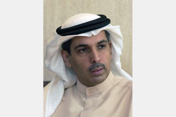 Adel Al-Shirawi knocks the bell to start trading on Nasdaq